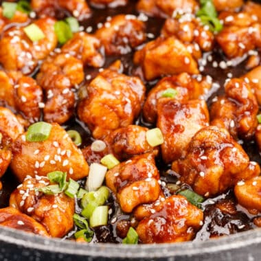 square image of general tso's chicken in a skillet