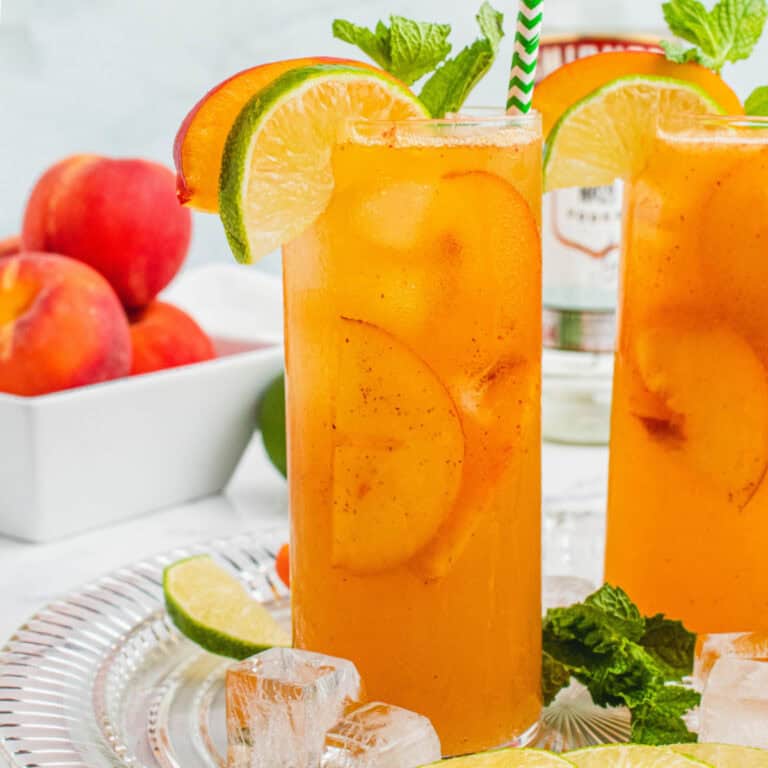 square image of two georgia mule cocktails on a tray