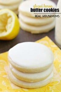 Stack of glazed lemon cookies on a yellow napkin