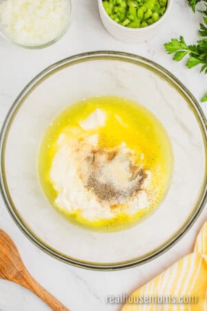 grandma's potato salad dressing ingredients in a large glass bowl
