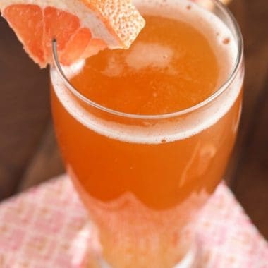 This light and refreshing GRAPEFRUIT SHANDY is bursting with sweet grapefruit flavor. It’s topped with ice cold beer, making it a shandy that's perfect for summer sipping!
