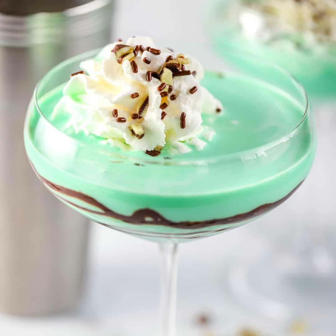 Try this sweet and creamy Grasshopper for St Patrick's Day! A mint-chocolate flavored cocktail made with only three ingredients!