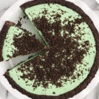 square image of a grasshopper pie with a slice cut out