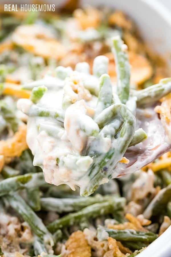 close up of a spoonful of green bean casserole