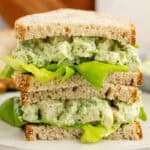 square image of a green goddess chicken salad cut in half with the halves stacked