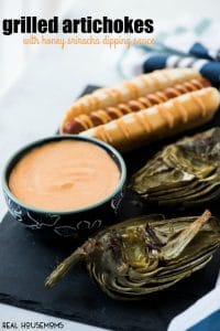Grilled Artichokes with Honey Sriracha Dipping Sauce make summer grilling super easy and tasty! I love to serve them up with a simple dish like grilled hot dogs.
