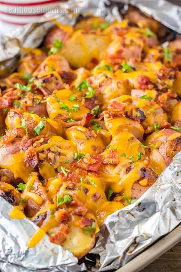 close up of grilled ranch potatoes with cheese and bacon