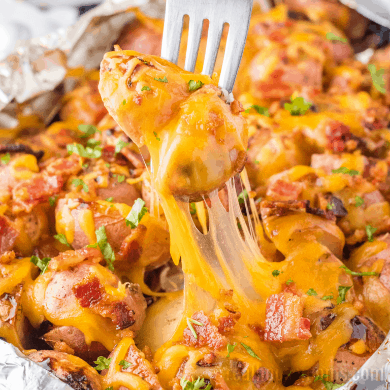 Grilled Ranch Potatoes are a simple side dish perfect for summer dinners. Just toss them on the grill and load them up with your favorite toppings!