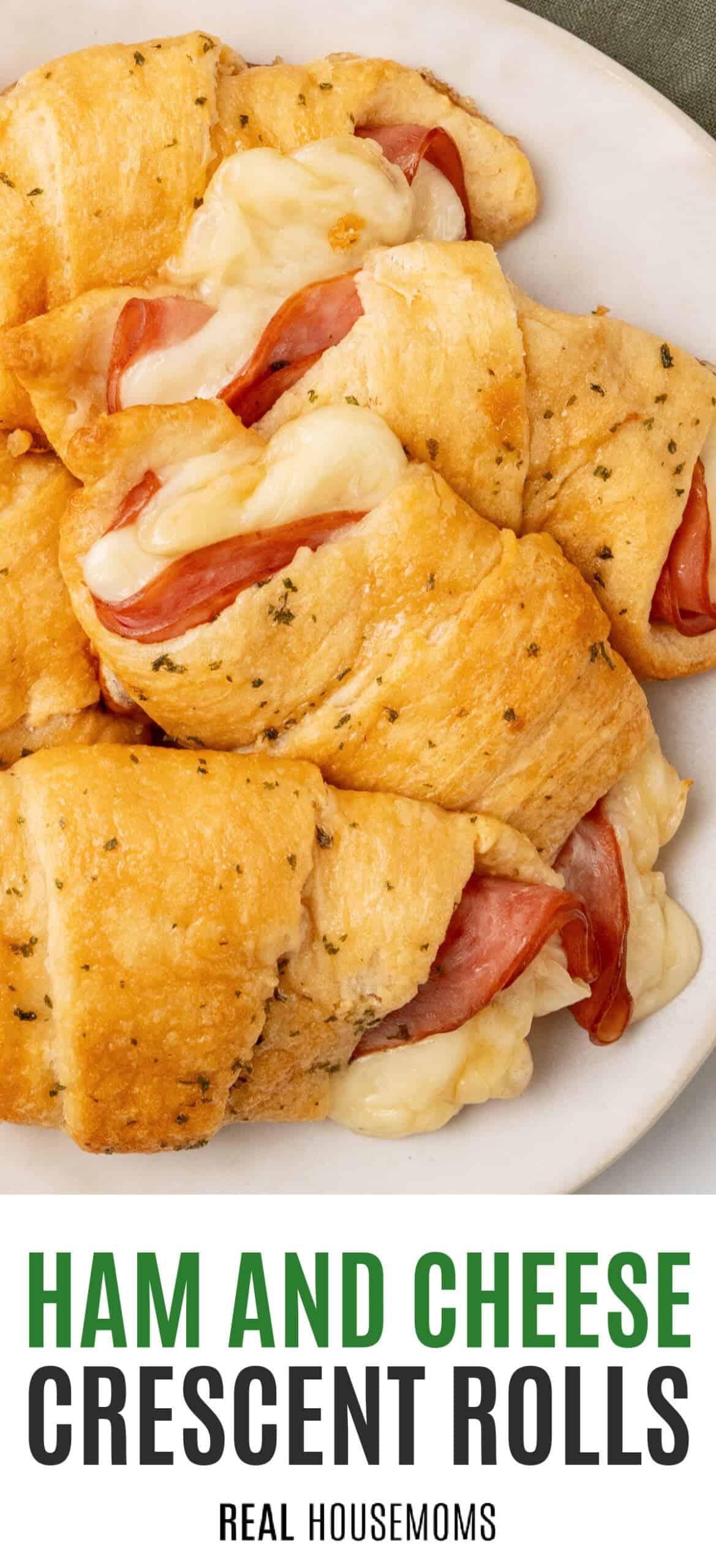 ham and cheese crescent rolls piled on a plate with recipe name at the bottom