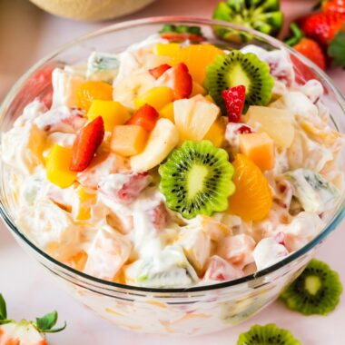 square image of Hawaiian cheesecake salad in a glass bowl
