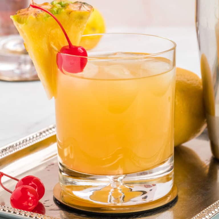 square image of hawaiian stone sour cocktail on a silver tray