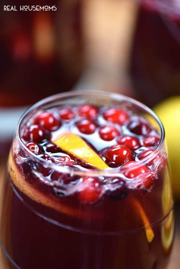 Holiday Sangria is a sweet wine cocktail loaded with fruit and juices that's a perfect drink for the holidays! Make it ahead of time to serve later!