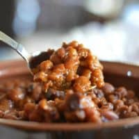 These homemade baked beans from scratch are so easy to make and have great flavor with the brown sugar, molasses and bacon. Your friends and family will think you're a superstar with this one.