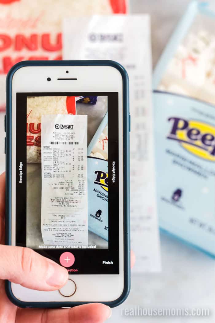 phone taking a picture of a shopping receipt