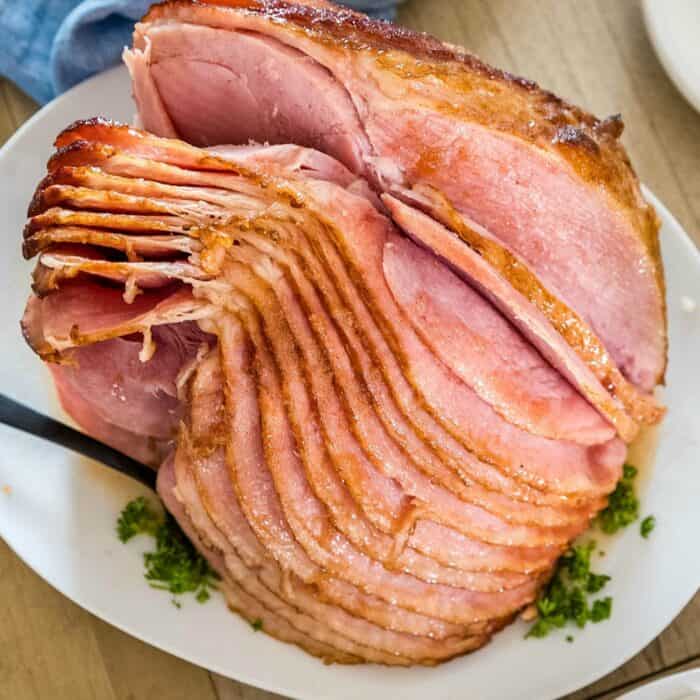 Honey Glazed Crock Pot Ham is a new spin on a traditional holiday favorite that will leave your family convinced that you ordered out this year!