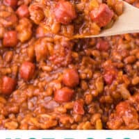 spoonful of hot dogs and beans over a baking dish with recipe name at the bottom