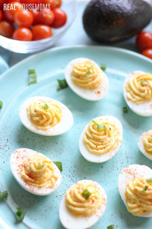deviled eggs on a blue plate