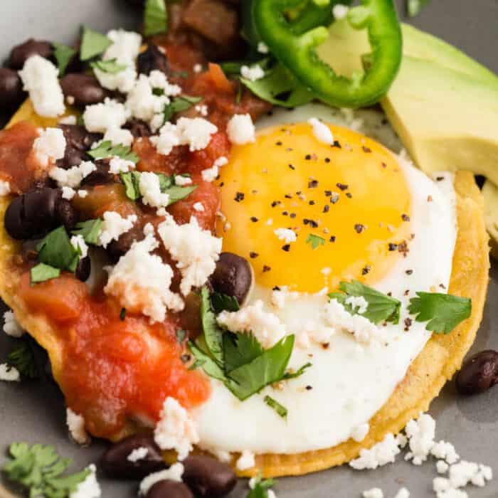 square close up image of huevos rancheros