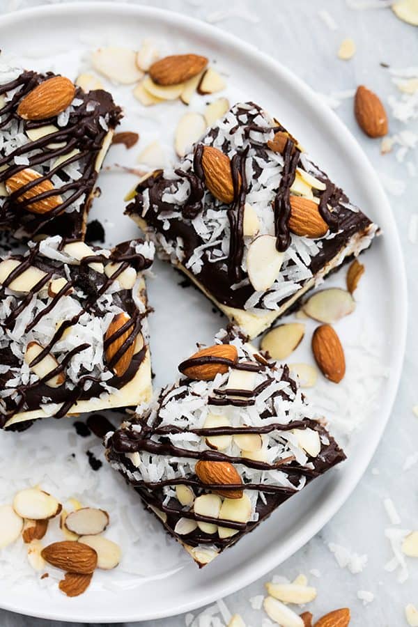 Chocolate and coconut are the stars of these incredibly yummy ALMOND JOY CHEESECAKE BARS! They're easy to make and are the hit of every party! 