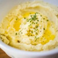 Save time and energy in the kitchen by making these easy and delicious Instant Pot Mashed Potatoes! A family favorite great for weeknights or the holidays!