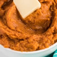 bowl of mashed sweet potatoes with recipes name at the top