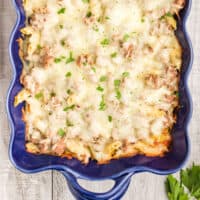 Italian baked penne casserole in a baking dish with recipe name at the bottom