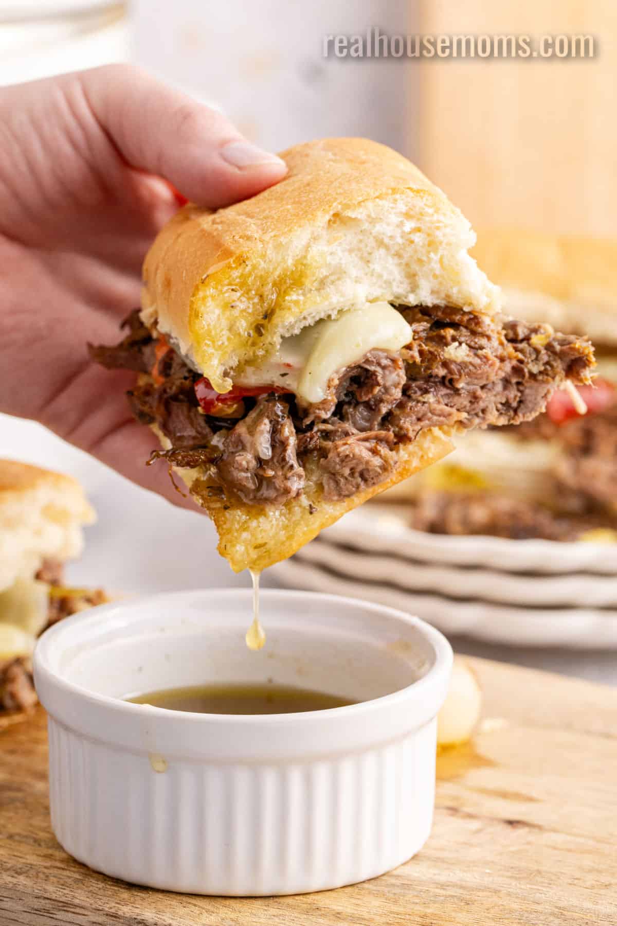 half of an italian beef sandwich dipped in extra gravy