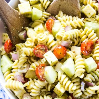 Italian Pesto Pasta Salad is a flavorful side dish that's guaranteed to be the star of every potluck or get-together you attend. The addition of the pesto turns this classic pasta salad into a summer must have!