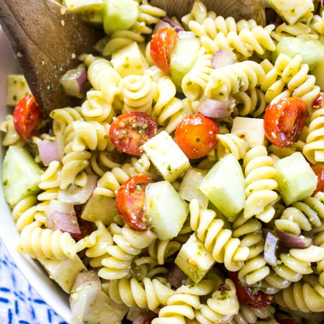 Italian Pesto Pasta Salad this flavorful side dish is guaranteed to be the star of every potluck or get-together you attend. The addition of the pesto turns this classic pasta salad into a summer must have!