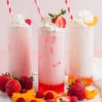 square image of three flavors of Italian soda on a tray with fresh fruit
