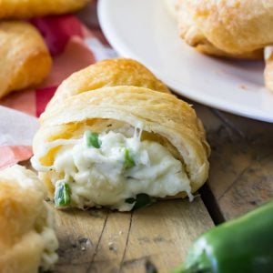 These Jalapeno Popper Crescent Rolls are made with pre-made crescent roll dough and with a simple jalapeno popper inspired filling. They take just 15 minutes to assemble and are sure to be a showstopper!
