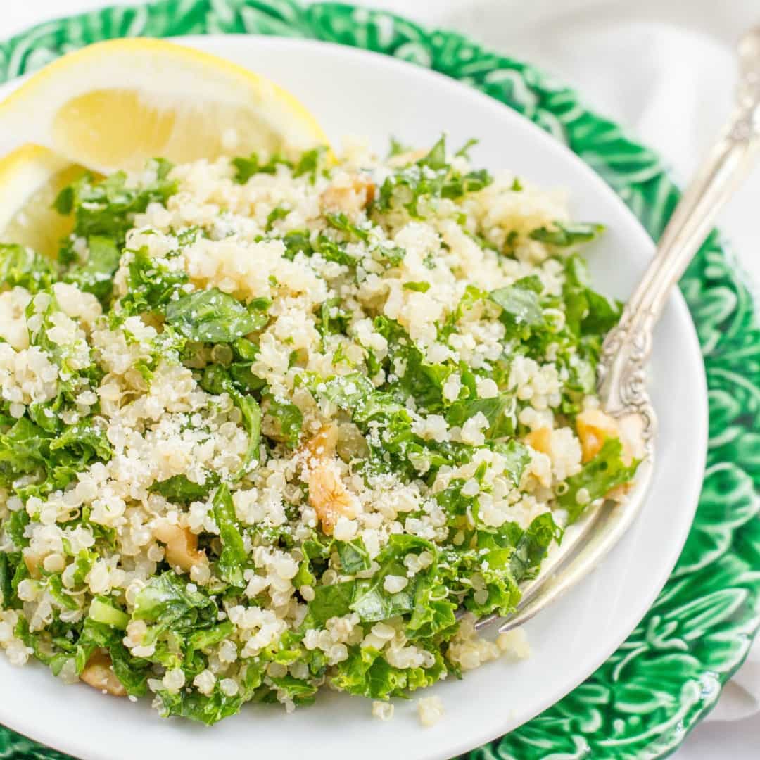Kale Quinoa Salad with chopped walnuts, grated Parmesan cheese, and a squeeze of lemon juice is a light, fresh and healthy side!