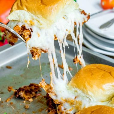 These Lasagna Sliders are bite sized sandwiches filled with all of the flavors of a classic lasagna! They're the perfect bite for your next party!