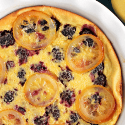 Bright lemon & juicy blackberries come together perfectly in this easy to make yet elegant LEMON AND BLACKBERRY CLAFOUTIS!