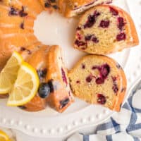 lemon blueberry pound cake with a few slices turned on their side with recipe name at the bottom