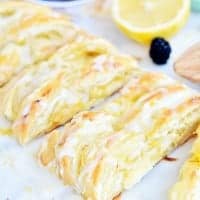 This flaky LEMON CREAM CHEESE DANISH is an easy breakfast or brunch recipe made with puff pastry and filled with a creamy, sweet and tart filling!