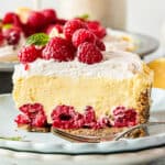 square image of a slice of lemon raspberry no bake pie on a plate showing all the layers