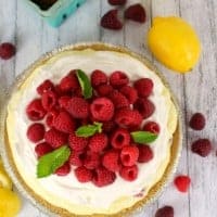 This LEMON RASPBERRY NO BAKE PIE is the perfect springtime dessert! Just as easy as it is delicious, this pie is great for Easter dinner, cookouts, or any get-together!