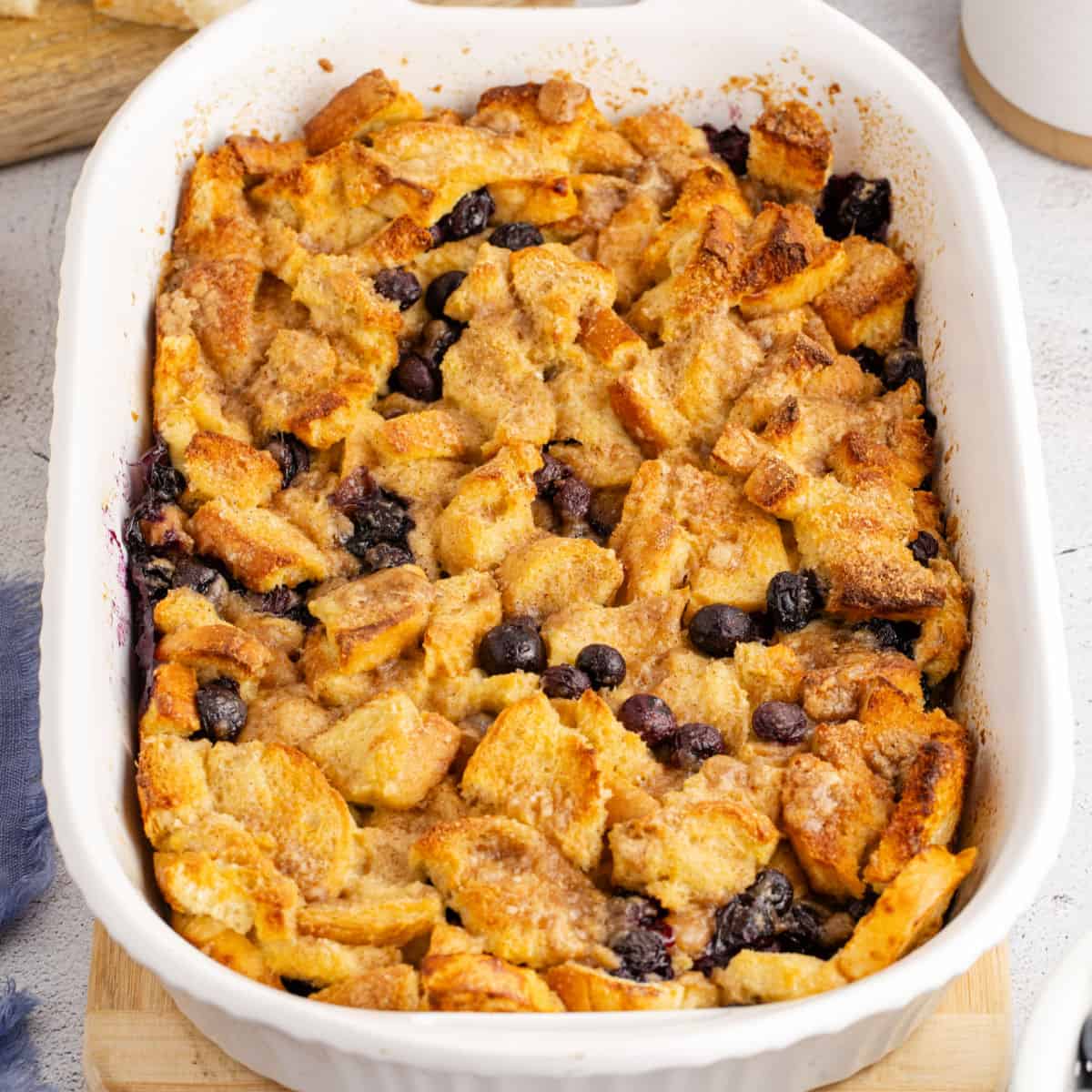 square image of lemon and blueberry french toast bake in a baking dish