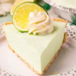 square image of Lime Jello Pie with cool whip and a lime slice on top