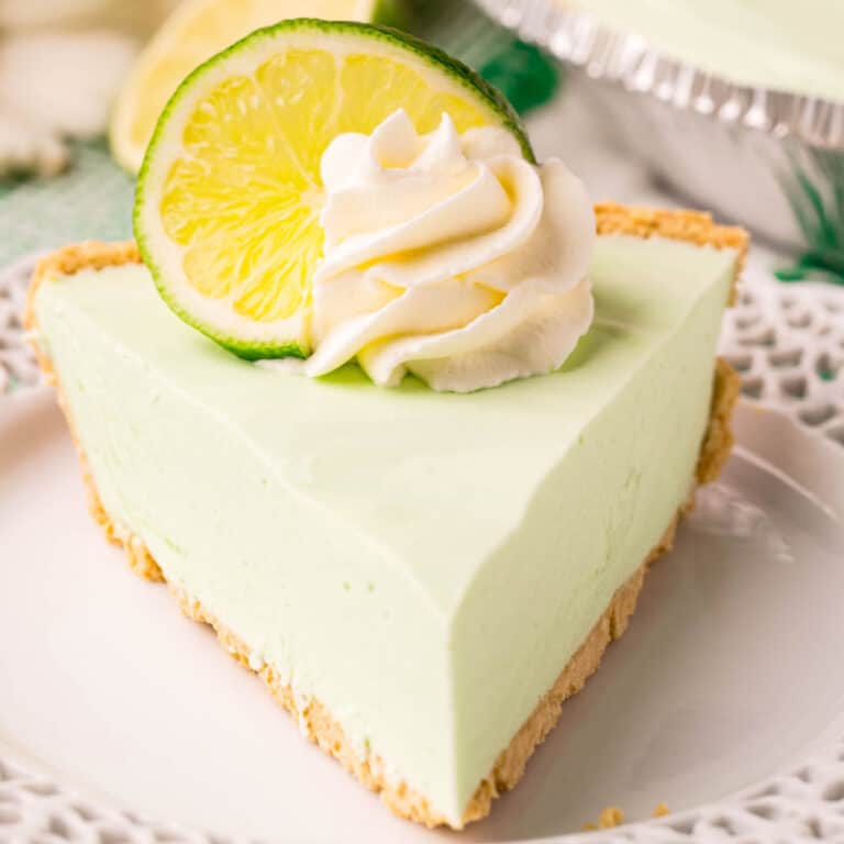 square image of Lime Jello Pie with cool whip and a lime slice on top