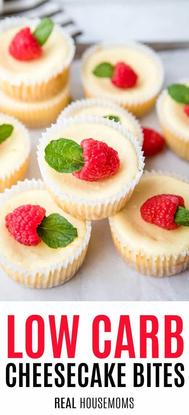 low carb cheesecake bites stacked up and topped with raspberries and mint