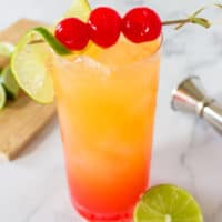 A Mexican Sunset is a delicious tequila cocktail that makes you feel like a beach bum on vacation! It's an eye-catching cocktail that makes my husband say, "Oh my!" So you know it's good!