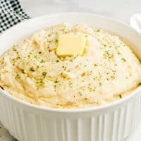 My Mom's Mashed Potatoes are light, fluffy, and bursting with comforting flavor. Her secret ingredients and special mixing tip will blow your taste buds away!