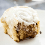 I used my Mamaw's roll recipe to make up the easiest cinnamon rolls of all time! These are big and fluffy! Full of cinnamon flavor and the perfect amount of warm frosting on top! Watch out Cinnabon!