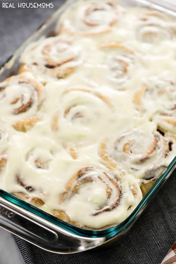 I used my Mamaw's roll recipe to make up the easiest cinnamon rolls of all time! These are big and fluffy! Full of cinnamon flavor and the perfect amount of warm frosting on top! Watch out Cinnabon!