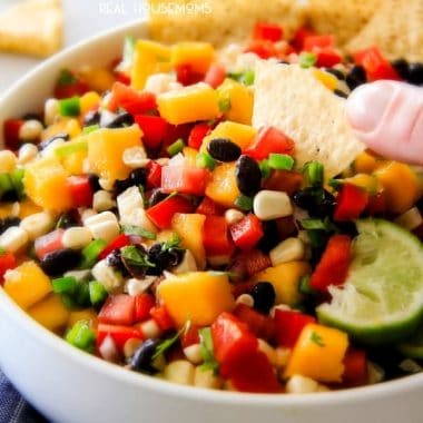 Mango Black Bean Salsa is fresh, vibrant, healthy, delicious and super simple to make! It’s a refreshing make-ahead appetizer or the perfect accompaniment to all your grilling entrees!