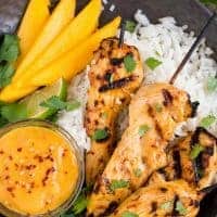 Cook up some yummy Thai food in your own backyard with these sweet and tender MANGO CHICKEN SKEWERS!