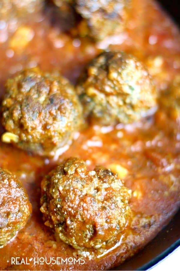 Meatball Parm bites are the perfect appetizer for your next gathering.  Tender meatballs, infused with garlic, breadcrumbs, and parmesan, smothered in red sauce and topped with melted mozzarella and fresh basil.