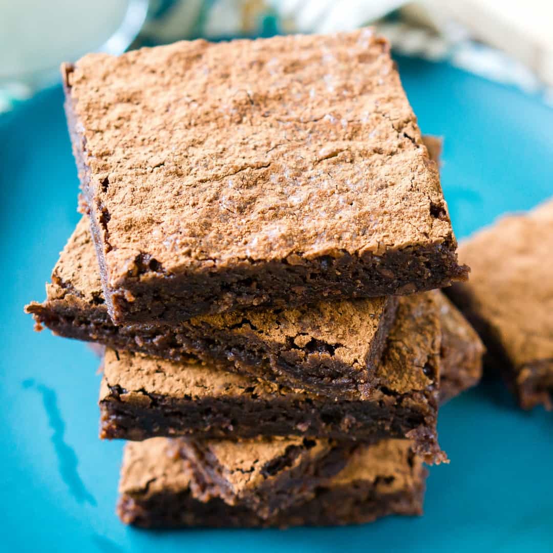 Mexican Brownies are a fun and delicious chocolate dessert! A fudge brownie is laced with hints of cayenne pepper and cinnamon for layers of surprising flavor!